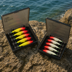 Squid Jig Lures in boxes on a rock